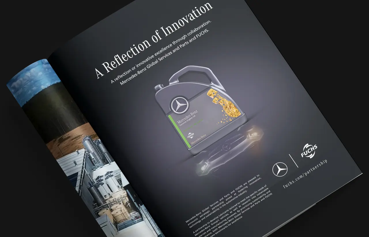 Open magazine spread of the Mercedes-Benz Genuine Engine Oil ad, A Reflection of Innovation, for the Mercedes-Benz and FUCHS partnership